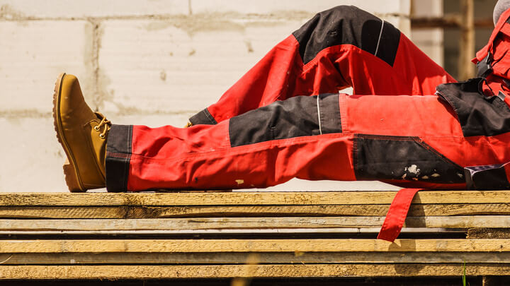 worker wearing red work trousers
