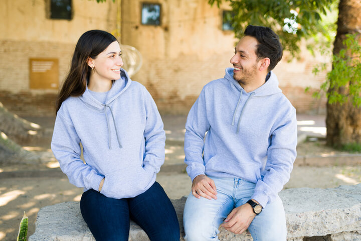 Couple Wearing Sweatshirts